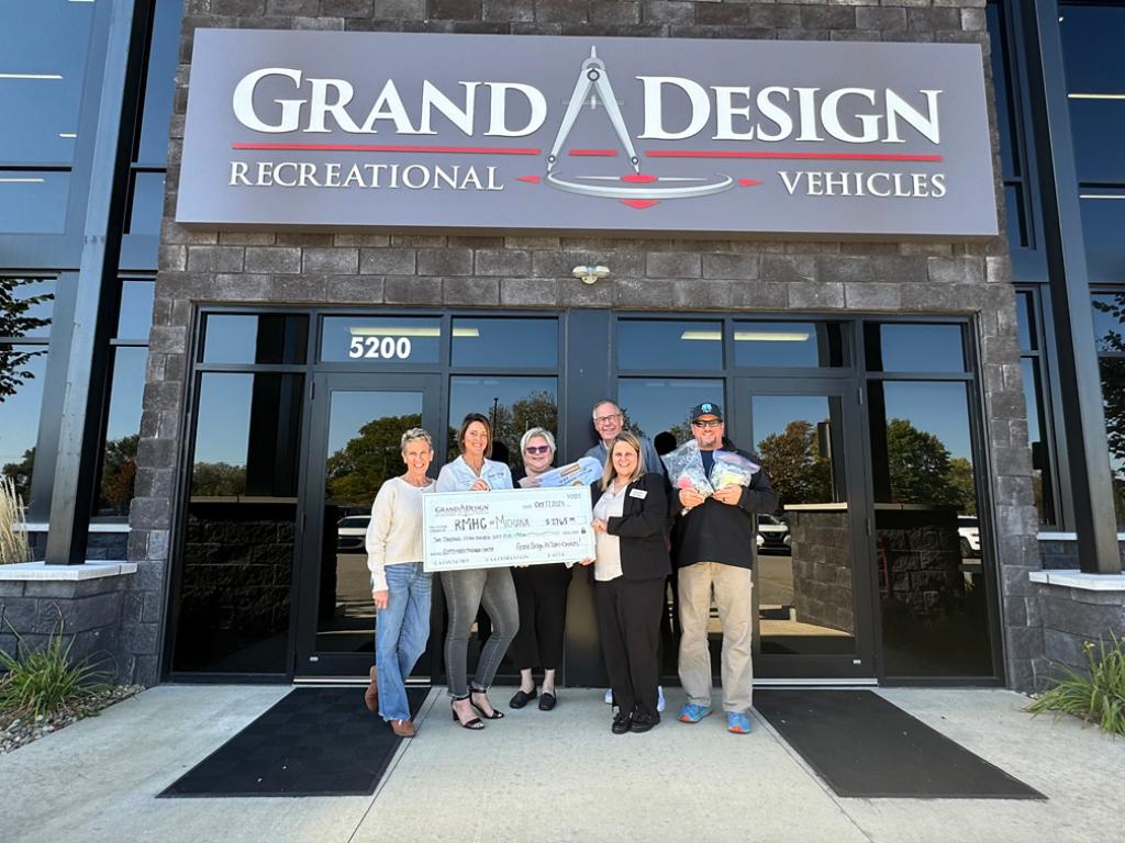 Grand Design team presenting a check to the Ronald McDonald House of Michiana