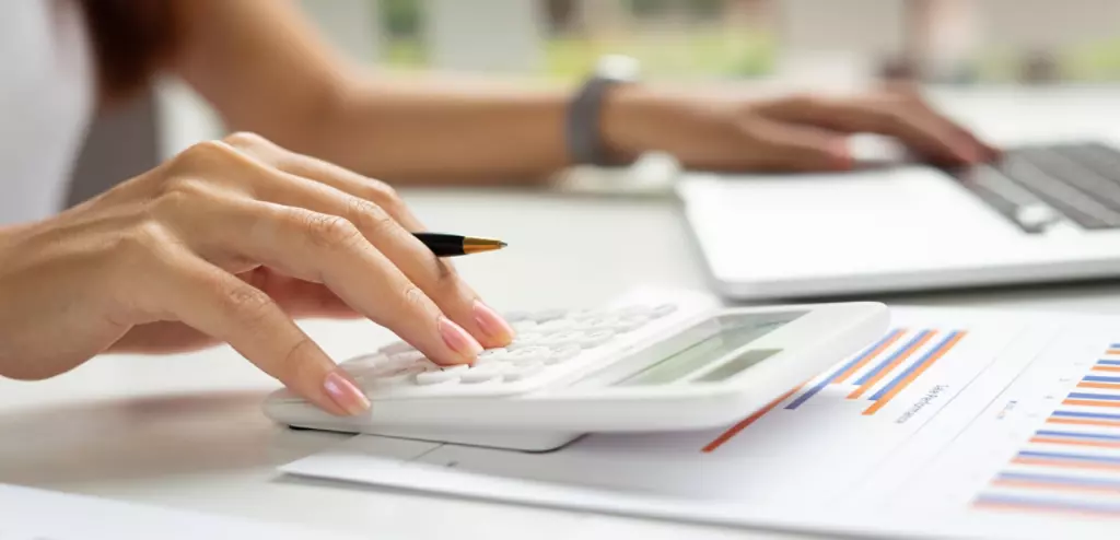 Woman calculating numbers. 