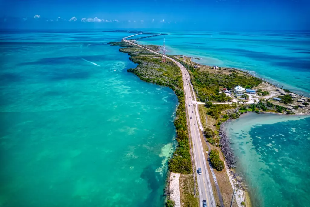 Aerial view of the Overseas Highway, with the ocean on both sides of the road.