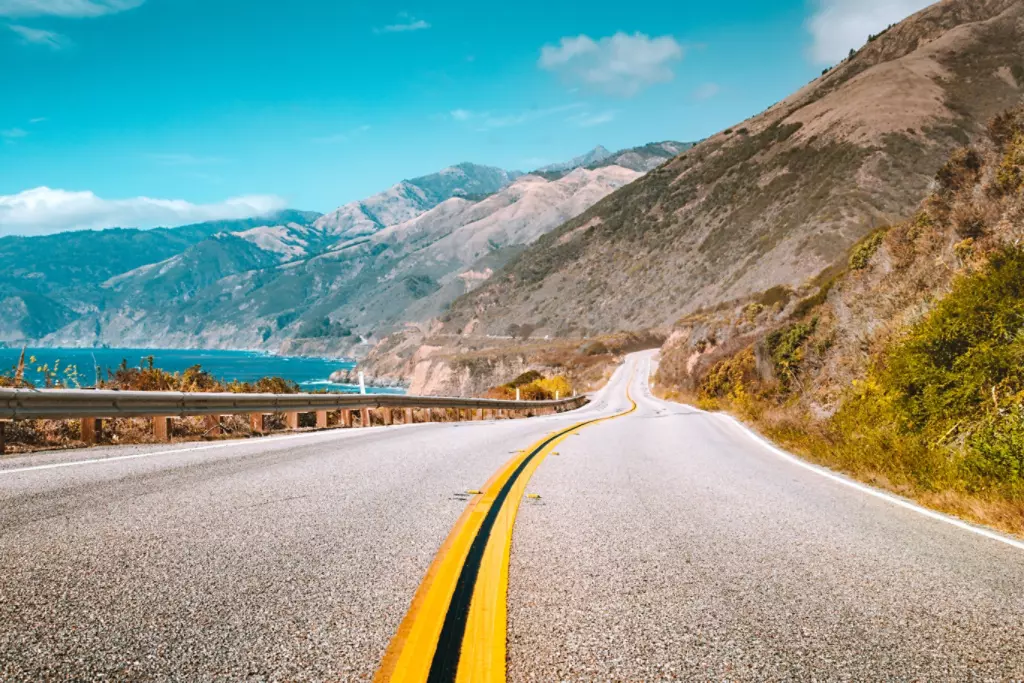 Mountainous view of highway along the Pacific coast.