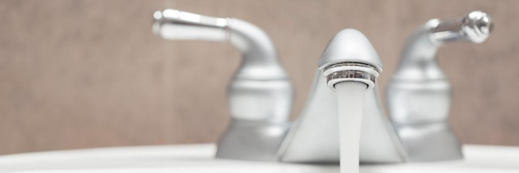 Faucet that is running water.